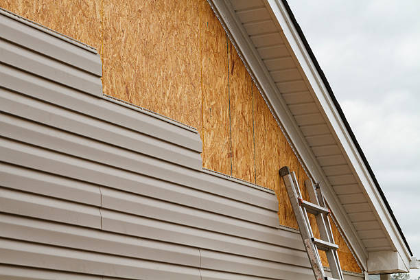 Professional Siding Installation technician working in Braddock, PA